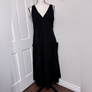 Relaxed V-Neck Pocketed Linen Dress by Vince.